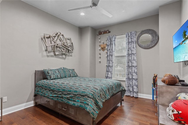 bedroom featuring ceiling fan and hardwood / wood-style floors