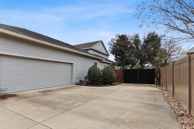 view of side of property featuring a garage