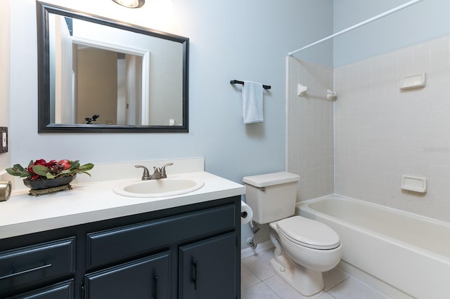 full bathroom featuring tile patterned floors, toilet, bathing tub / shower combination, and vanity