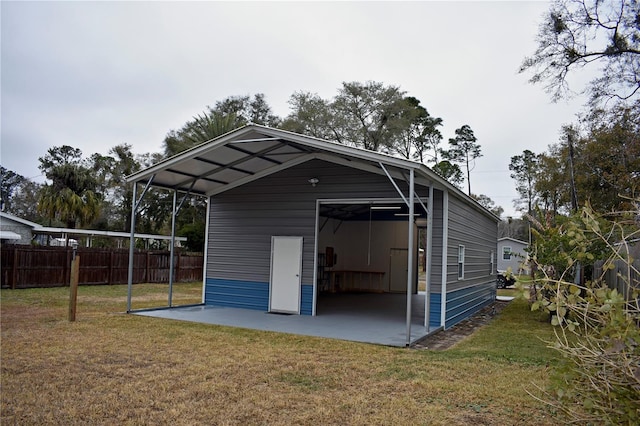 view of outbuilding featuring a yard