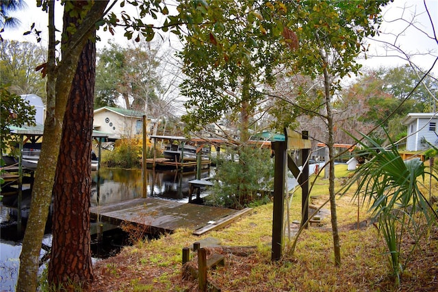 view of dock with a water view