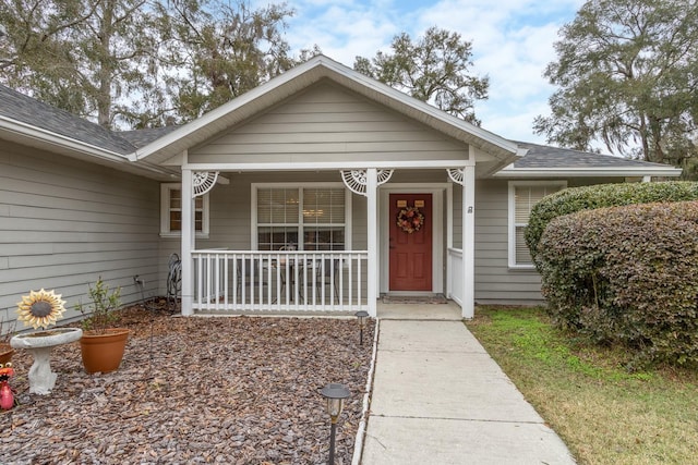 view of front of property featuring covered porch