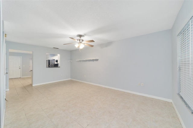 empty room with ceiling fan