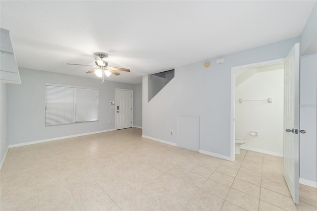 spare room with ceiling fan