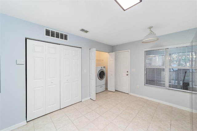 washroom featuring washer / clothes dryer