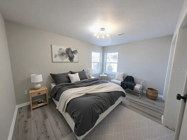 bedroom featuring light wood-type flooring