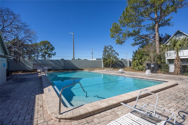 view of swimming pool featuring a patio