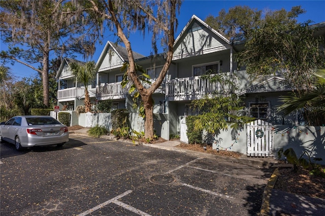 multi unit property featuring a balcony