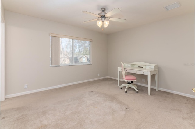 office featuring ceiling fan and light colored carpet