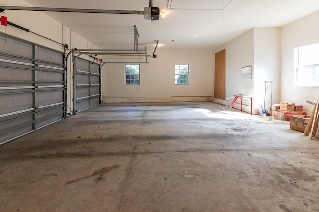 garage featuring a garage door opener