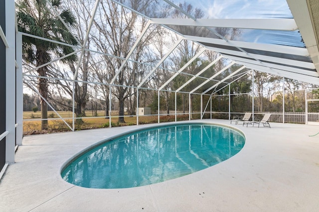 view of pool featuring a lanai and a patio area