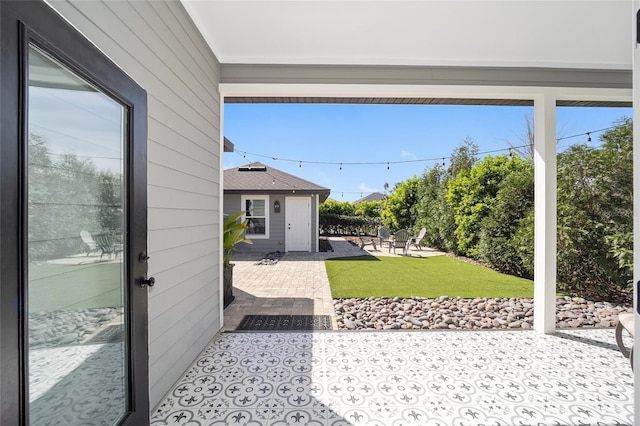 view of patio / terrace with an outdoor structure