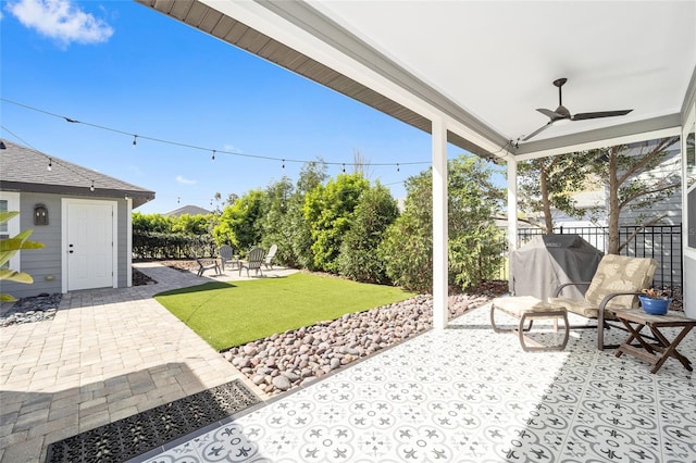 view of patio with ceiling fan