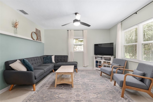 living room featuring ceiling fan