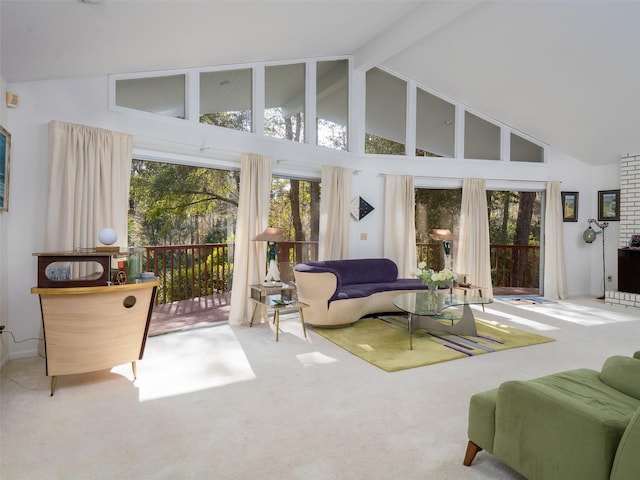 sunroom / solarium with lofted ceiling with beams