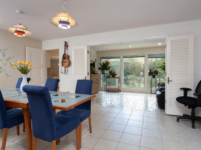 dining area with light tile patterned floors