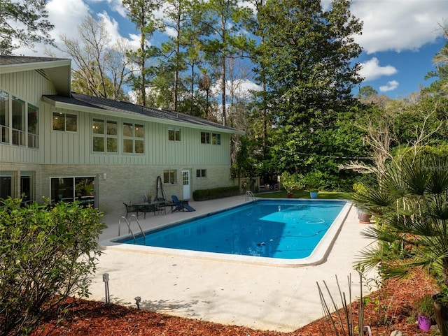 pool with a patio