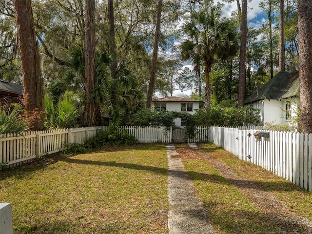 view of yard with a fenced front yard