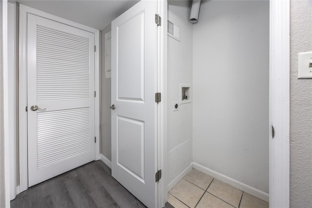 corridor featuring hardwood / wood-style floors