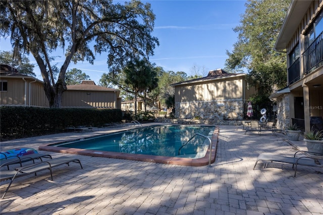 view of pool with a patio area