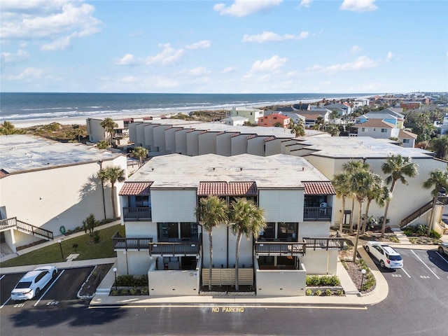 bird's eye view with a view of the beach and a water view