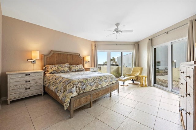 tiled bedroom with access to exterior and ceiling fan