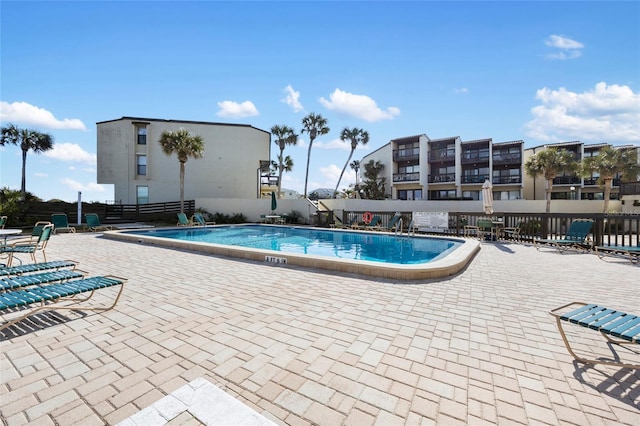 view of swimming pool featuring a patio