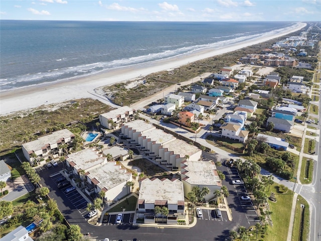 drone / aerial view with a view of the beach and a water view