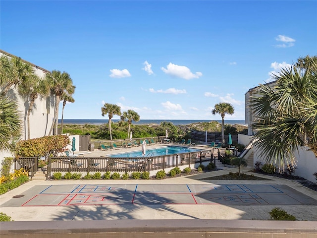 view of swimming pool featuring a patio area