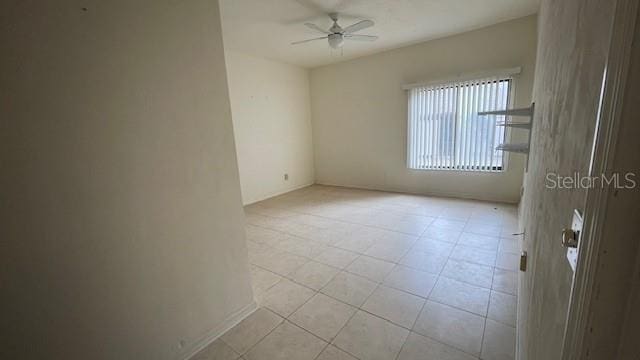 spare room featuring ceiling fan