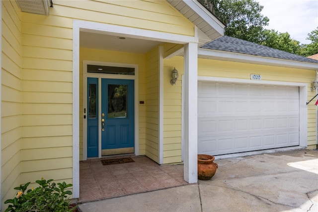 property entrance featuring a garage