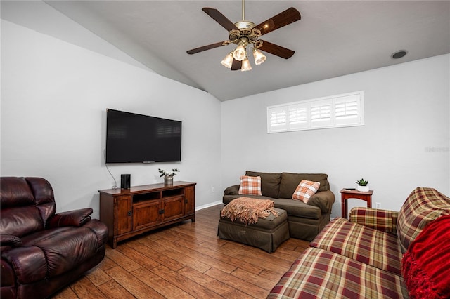 living room with ceiling fan, wood-type flooring, and vaulted ceiling