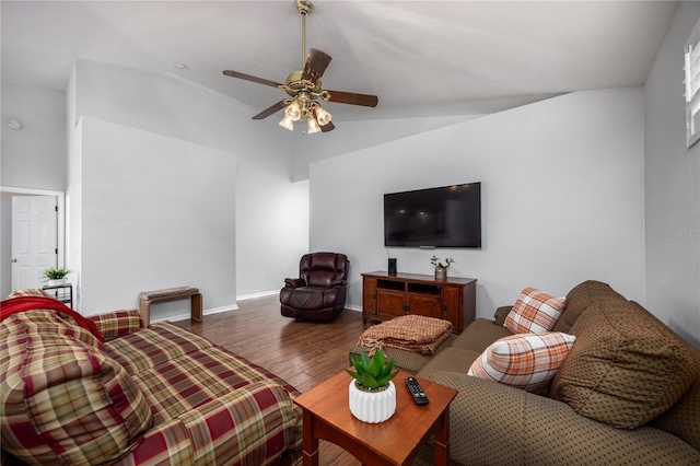 living room featuring vaulted ceiling, ceiling fan, and hardwood / wood-style floors