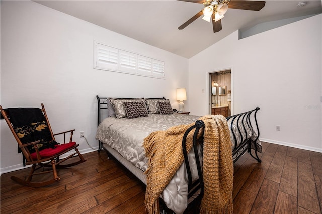 bedroom with lofted ceiling, connected bathroom, dark wood-type flooring, and ceiling fan