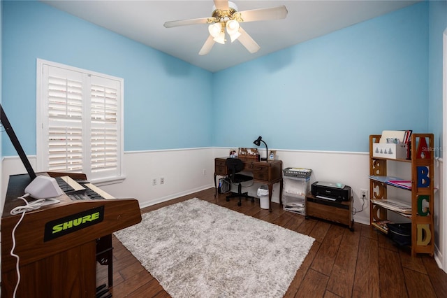 office space with dark hardwood / wood-style flooring and ceiling fan