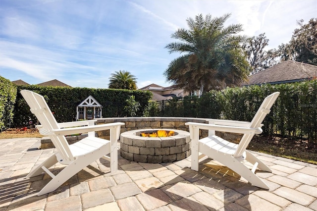 view of patio / terrace with an outdoor fire pit