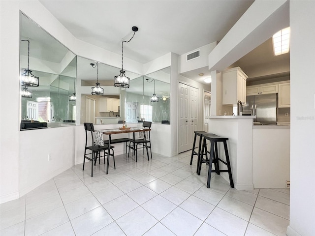 view of tiled dining area