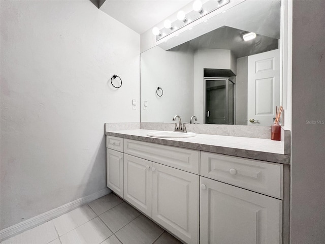 bathroom featuring vanity and tile patterned floors