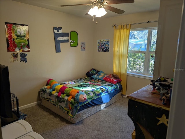 bedroom with ceiling fan and carpet