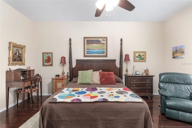 bedroom with ceiling fan and dark hardwood / wood-style floors