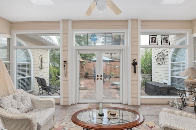 entryway featuring ceiling fan