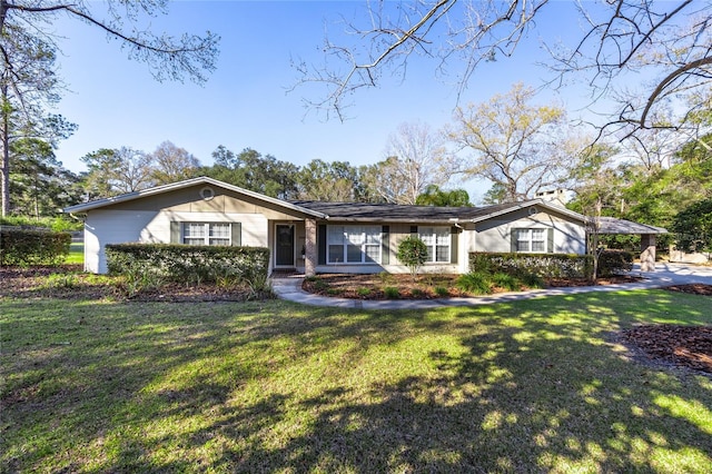 single story home with a front yard