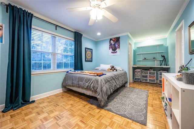 bedroom featuring ceiling fan, baseboards, and crown molding