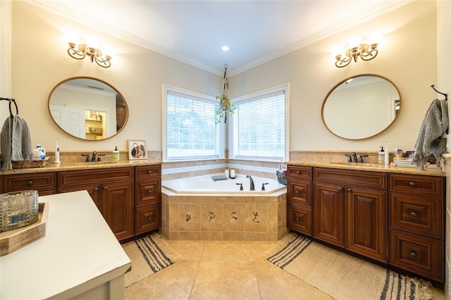 full bath with a garden tub, crown molding, two vanities, a sink, and tile patterned flooring