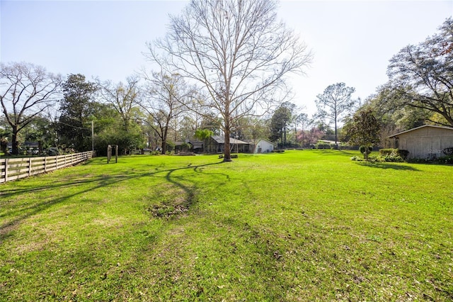 view of yard with fence