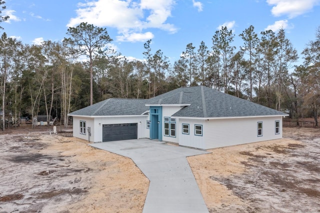 view of front of home with a garage