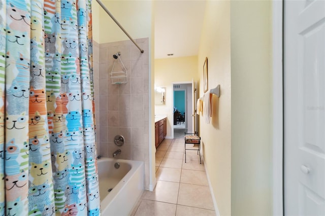 bathroom with vanity, shower / tub combo, and tile patterned floors