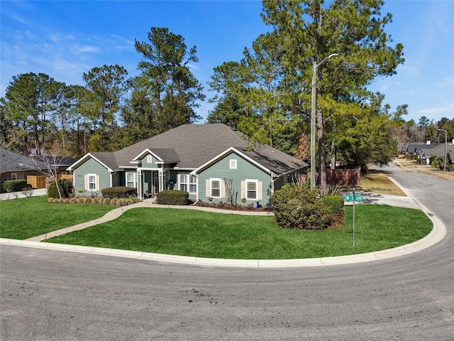 view of front of home with a front lawn