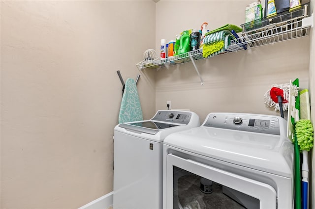 laundry room featuring washer and clothes dryer