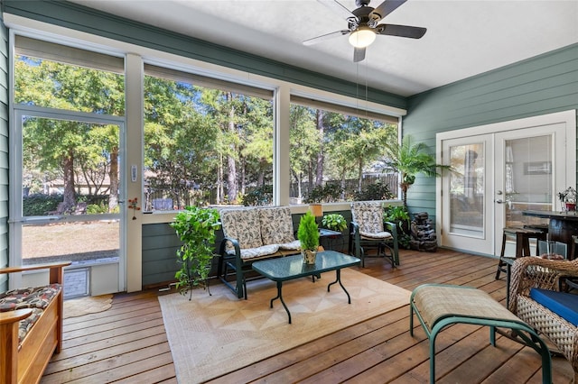 sunroom featuring french doors, ceiling fan, and a wealth of natural light